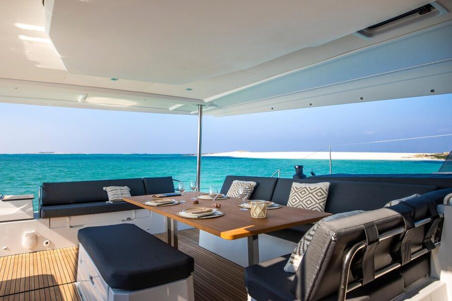Mykonos: Catamaran Cruise with 3-Course Meal and Transfers - Pickup, Van Ride, and Getting Aboard