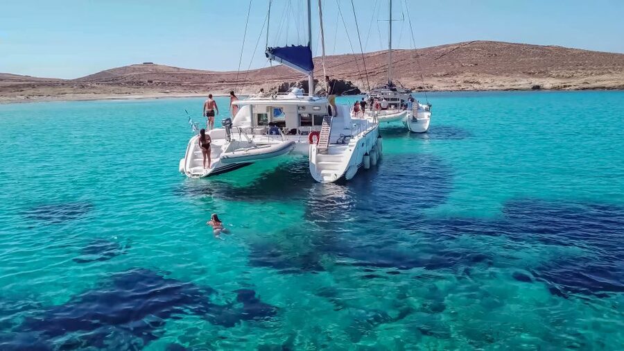 Mykonos: Catamaran Cruise with Lunch, Drinks and Transfer - Lunch served on the boat