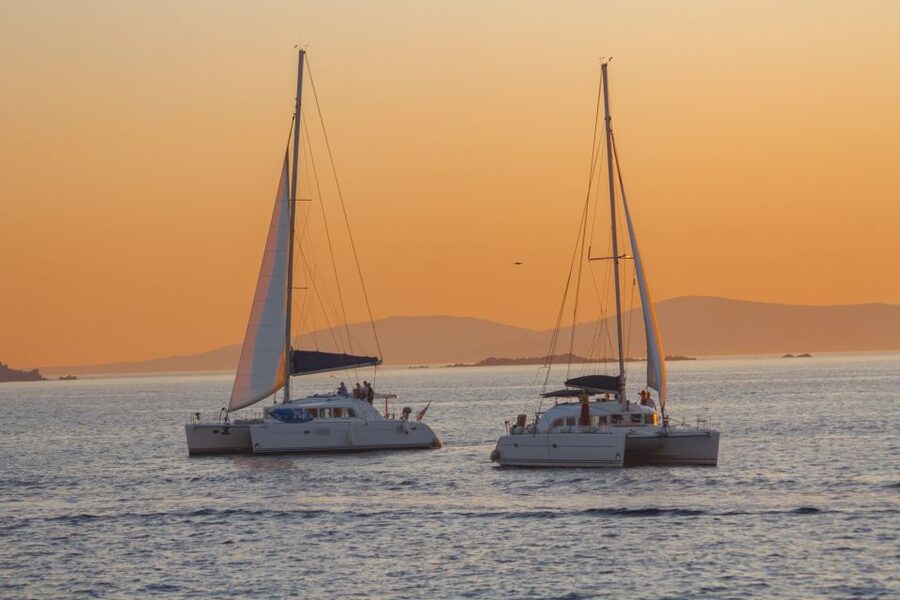Mykonos: Catamaran Cruise with Lunch, Drinks and Transfer - How the crew shapes the day