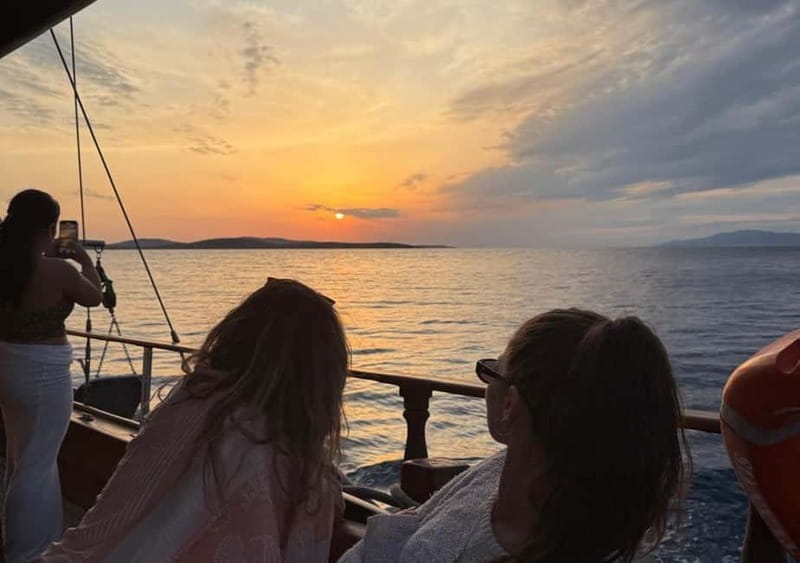 Mykonos: Sunset Boat Cruise with Light Dinner & Drinks - Ornos, Psarou, and Platis Gialos from the sea