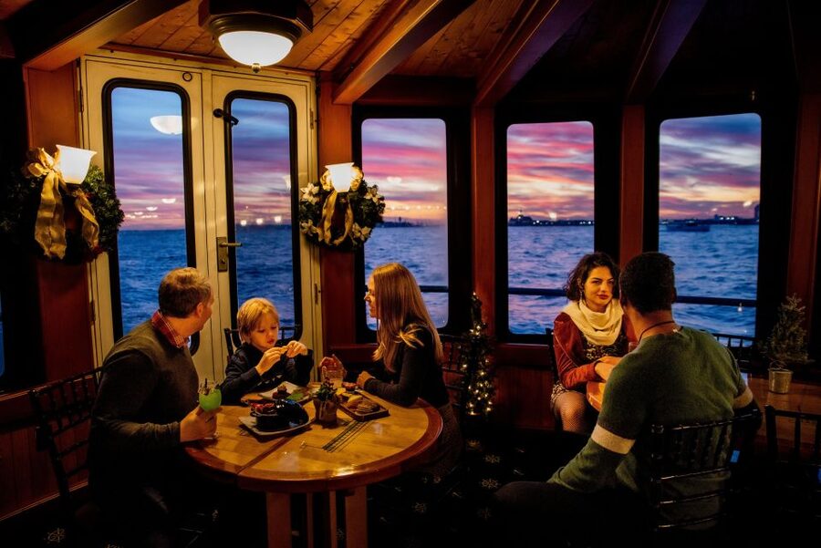 NYC: Holiday Yacht Cruise with Jazz, Cocoa & Carols - The Statue of Liberty moment