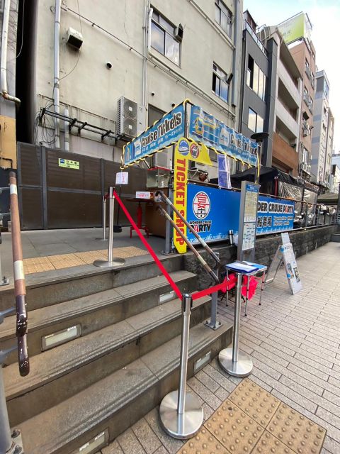 Osaka: Dotonbori District River Cruise with Drink Discount - What happens during the 20-minute ride