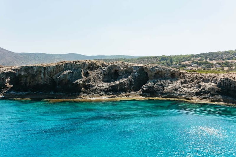 Paphos: Blue Lagoon Boat Adventure with Bus Transfer - Fruit, juice, wine, and the onboard bar