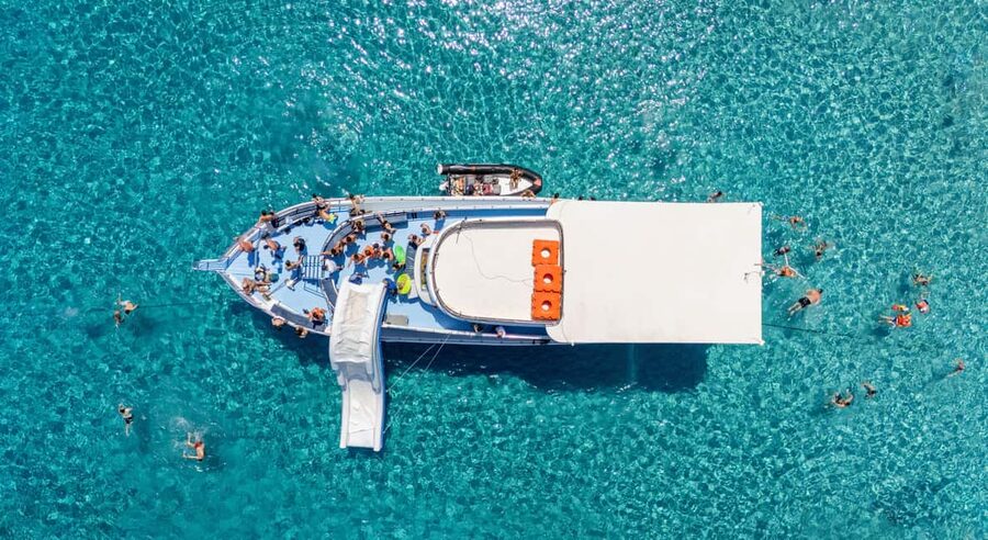 Paphos Blue Lagoon Cruise: Slide, Music & Hotel Transfer - Akamas coast landmarks along the route