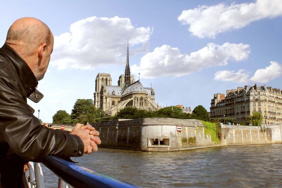 Paris: Eiffel Tower Hosted Tour, Seine Cruise and City Tour - Cruising past the Louvre and Notre-Dame