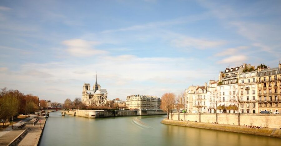 Paris: Eiffel Tower Tour & Seine River Cruise Tour - Walking toward the Iron Lady