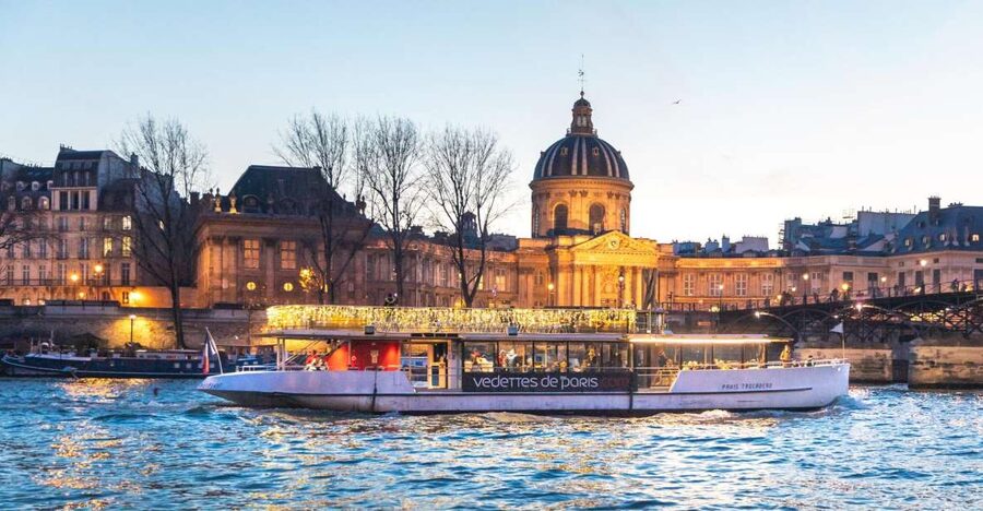 Paris: Evening River Cruise with Music - Paris after dark from a quiet electric boat