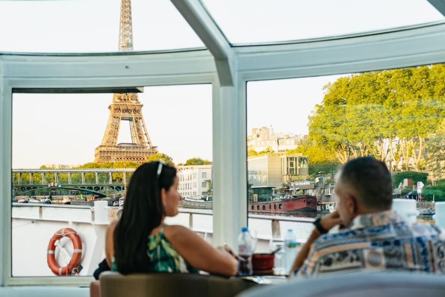 Paris: Seine River Panoramic Views Dinner Cruise - A small boat with a front-row view of Paris
