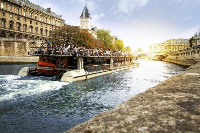 Paris Seine River Sightseeing Cruise with Commentary by Bateaux Parisiens - Open-air seats, enclosed comfort, and changing weather