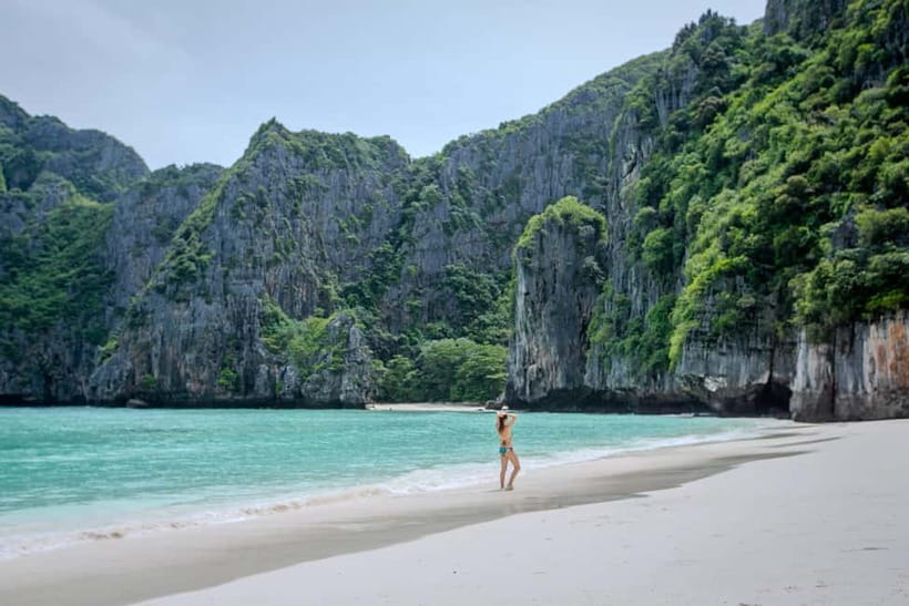 Phi Phi: 7 Island Longtail Boat Snorkeling Tour with Sunset - Pileh Lagoon is the first major swim stop