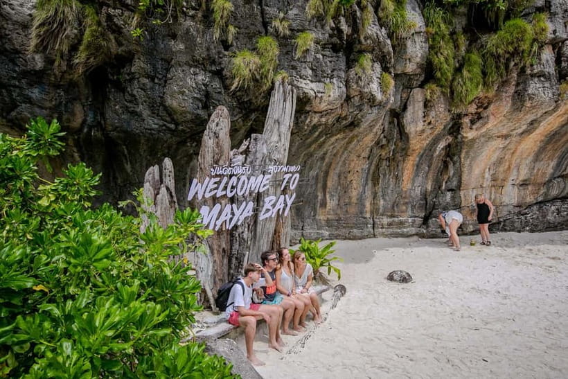 Phi Phi: 7 Island Longtail Boat Snorkeling Tour with Sunset - Monkey Beach begins the day with a little chaos