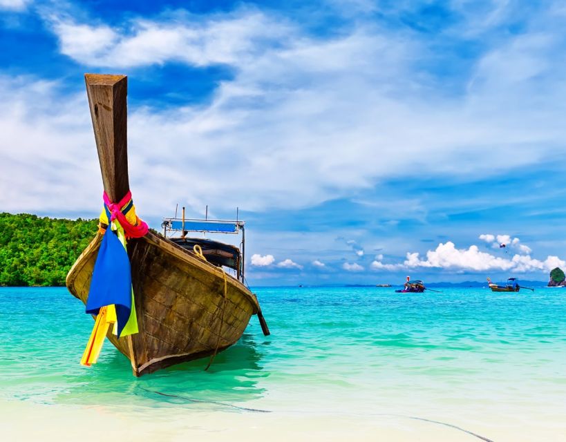 Phuket: James Bond Island Longtail Boat and Sea Canoe Tour - Longtail boats through Ao Phang Nga National Park