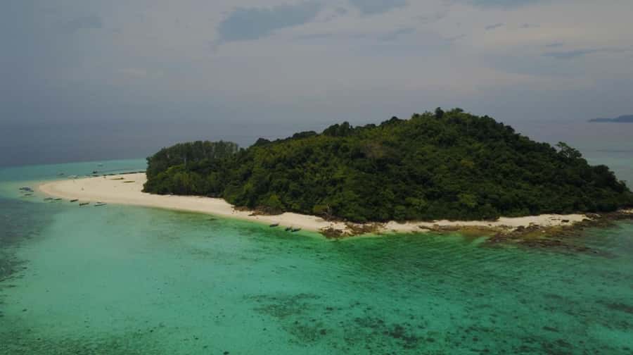 Phuket: Phi Phi Sunrise Boat Tour to Bamboo and Khai Island - Pileh Lagoon and Phi Phi’s open-water stops