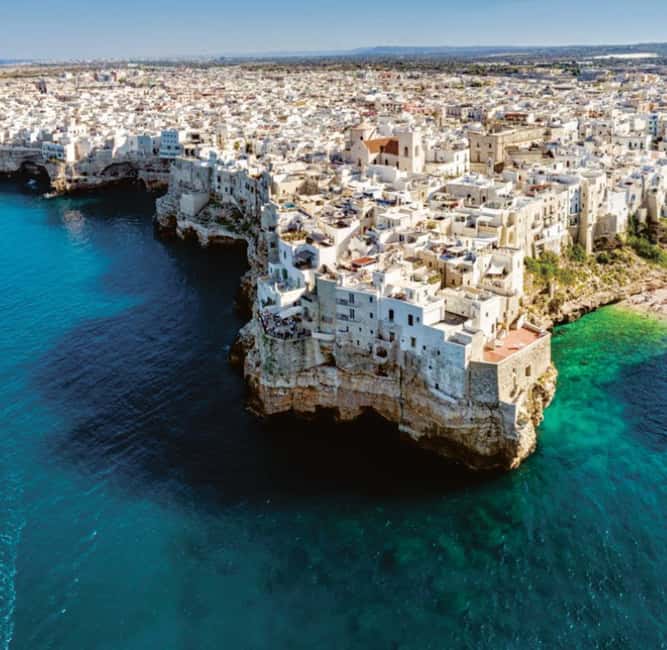 Polignano a Mare Boat Tour with Prosecco and Taralli - The first views: Modugno, Lama Monachile, and the cliffs