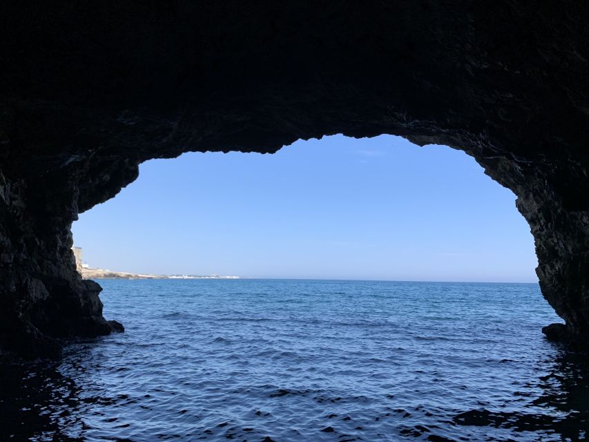 Polignano a Mare: Cave Boat Tour with Aperitif - Lama Monachile Beach from below the cliffs