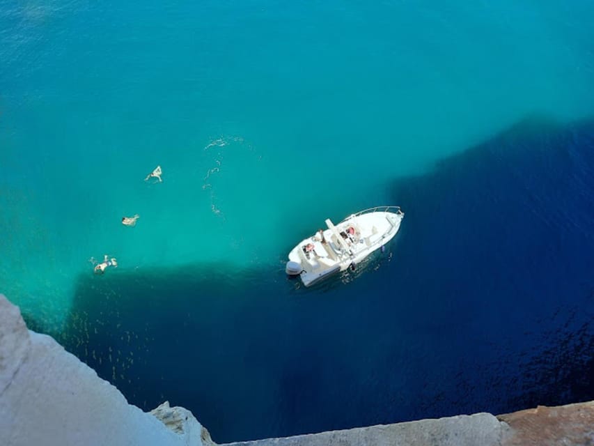 Polignano's coast and caves: a boat tour with drinks, swimming, music, and fun - A swim stop with drinks and snacks