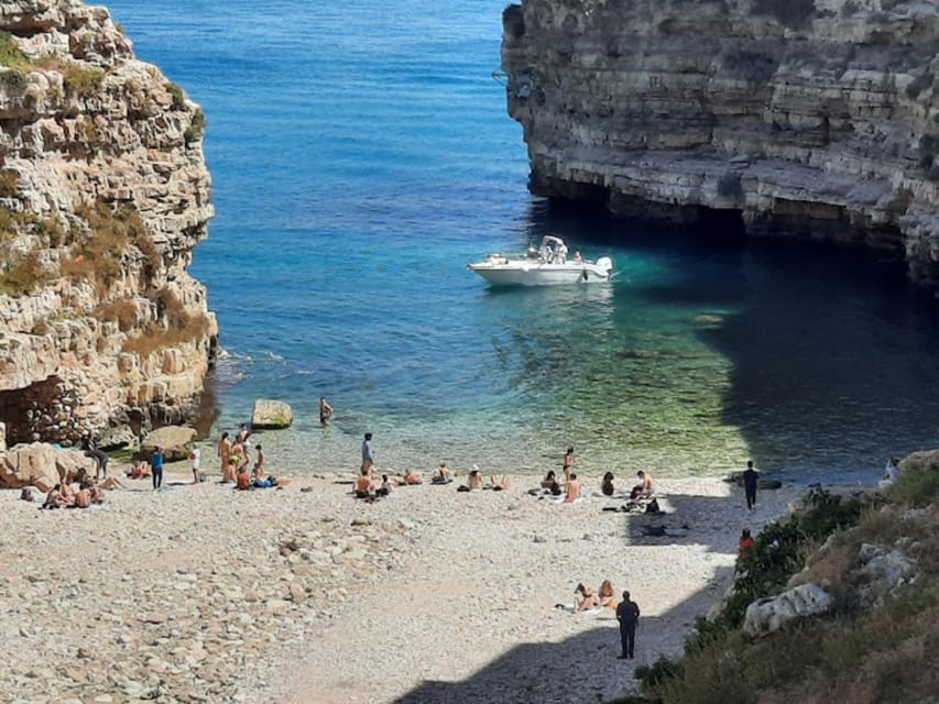Polignano's coast and caves: a boat tour with drinks, swimming, music, and fun - What the $41 price really covers