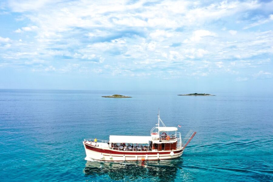 Poreč: Panoramic Morning Cruise Among 20 Islands with Drinks - Drinks, crew spirit, and the boat itself