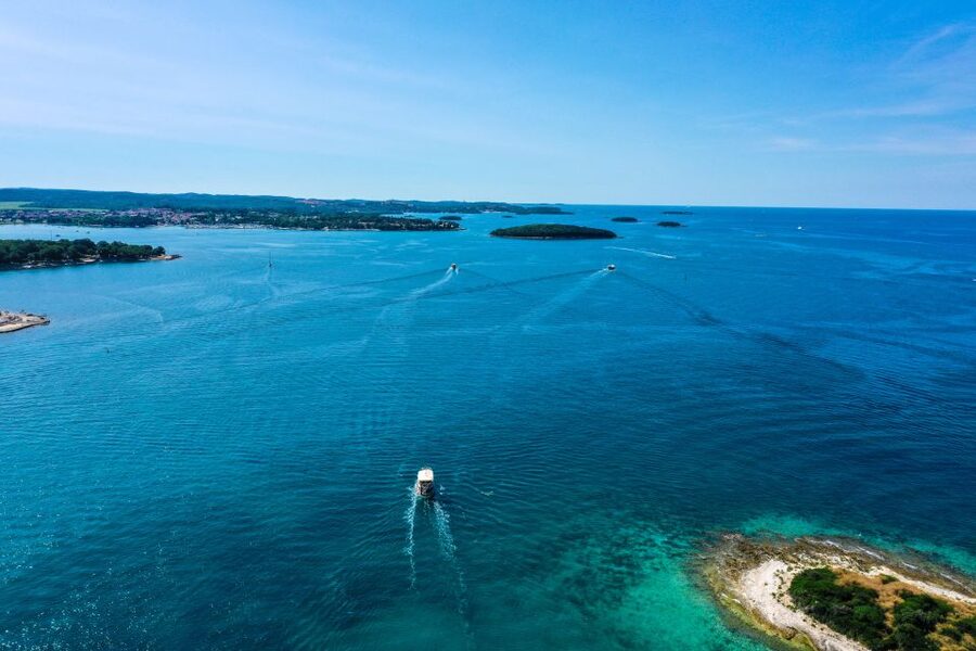 Poreč: Panoramic Morning Cruise Among 20 Islands with Drinks - Watching for dolphins without expecting them