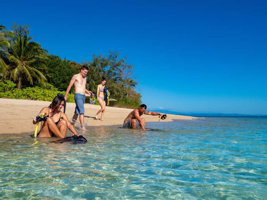 Port Douglas: Low Isles Glass Bottom Boat & Snorkeling Tour - Snorkeling in the calm Low Isles lagoon