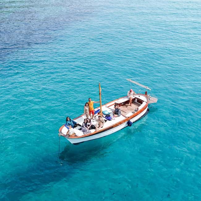 Porto San Paolo: Half Day Boat Tour to Tavolara and Molara - Spiaggia del Dottore: your first swim