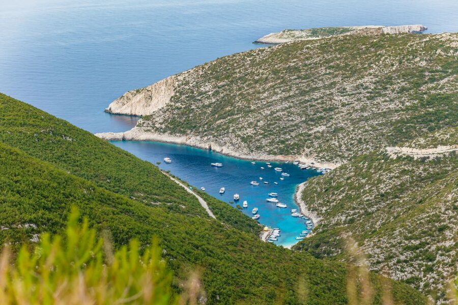 Porto Vromi: Shipwreck, Caves, & White Beach Swimming Cruise - Blue Caves and clever boat handling