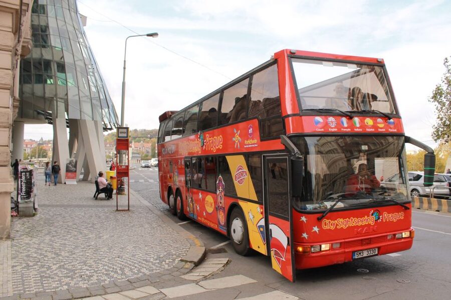 Prague: City Sightseeing HOHO Bus Tour & Optional Boat Tour - Audio, comfort, and boarding realities