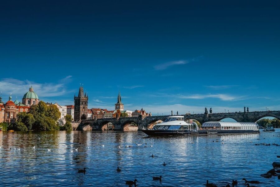 Prague: Evening Vltava River Eco Cruise with Prosecco - Charles Bridge from below