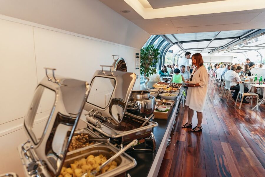 Prague: Sightseeing Dinner Cruise on Open-Top Glass Boat - Rudolfinum, the Dancing House, and the changing city