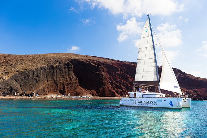 Premium Small-Group Catamaran Cruise with BBQ, Open Bar, Transfer - Red Beach and White Beach from the water
