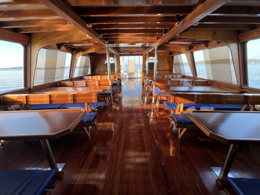 Pula: Dolphin Watching Sunset Cruise with Dinner & Drinks - What $65 gets you