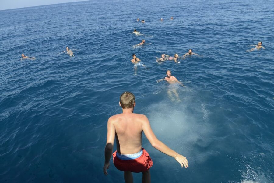 Rethymno: Pirate Boat Cruise with Swimming Stop - Leaving Rethymno Marina beneath the Fortezza