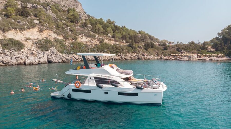 Rhodes: All-Inclusive Catamaran Cruise with Lunch and Drinks - Afandou Caves on the power catamaran