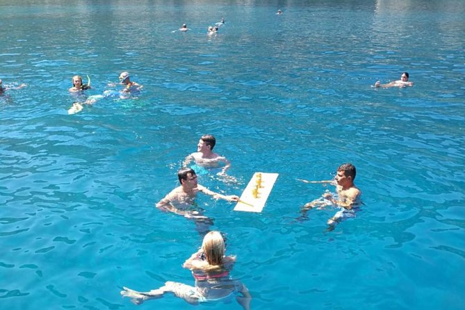 Rhodes Exclusive Swim Cruise Cocktail Open bar & Gourmet Buffet - Lunch on board: Greek dishes with room for dietary needs