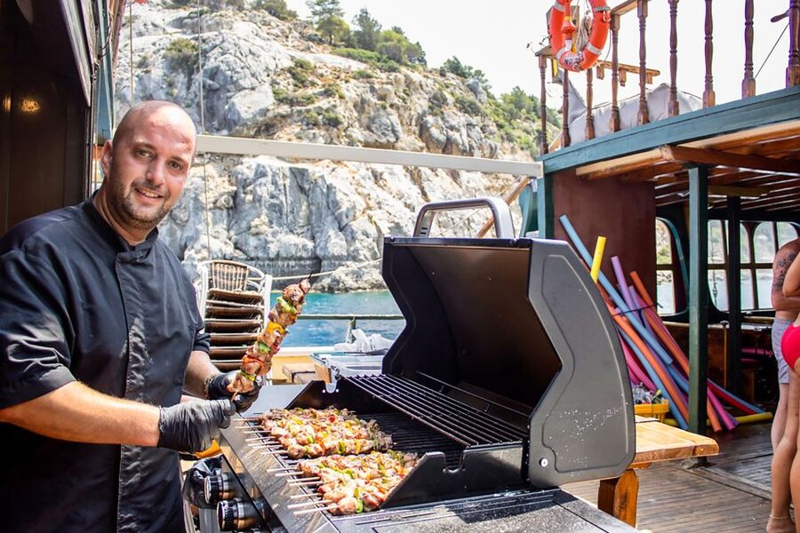 Rhodes: Sunset Cruise with Greek BBQ and Unlimited Drinks - Unlimited drinks, cocktails, and the relaxed atmosphere