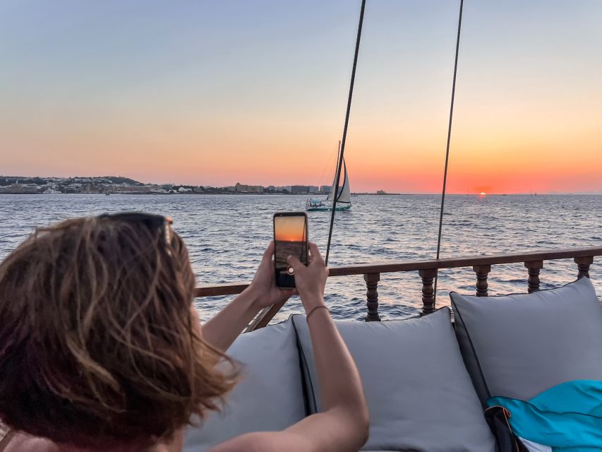 Rhodes: Sunset Cruise with Greek BBQ and Unlimited Drinks - Choosing between the lower deck and bean bags