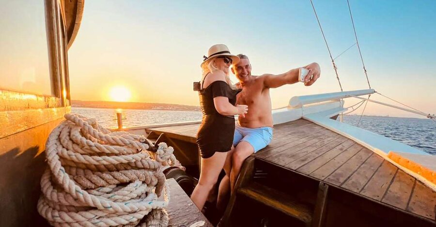 Rhodes: Sunset Cruise with Greek BBQ and Unlimited Drinks - The return sailing and Rhodes sunset