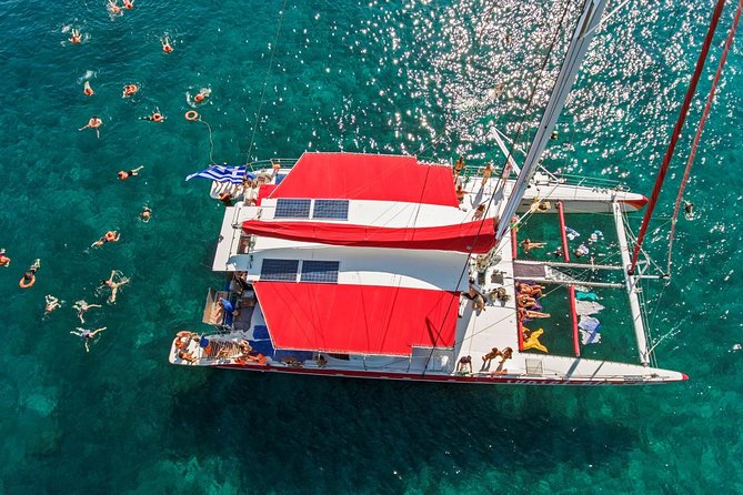 Sailing Catamaran Cruise in Santorini with BBQ, Drinks and Transfer - Santorini from the water, not the switchback roads