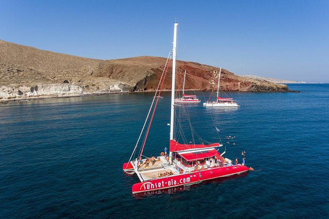 Sailing Catamaran Cruise in Santorini with BBQ, Drinks and Transfer - Hot springs near Palea Kameni