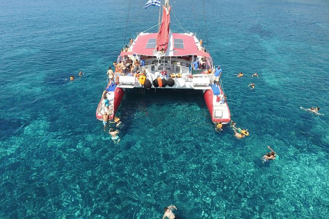Sailing Catamaran Cruise in Santorini with BBQ, Drinks and Transfer - What the catamaran feels like during five hours