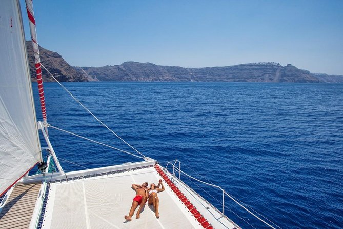 Sailing Catamaran Cruise in Santorini with BBQ, Drinks and Transfer - Who will like this Santorini cruise