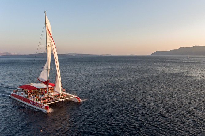 Sailing Catamaran Cruise in Santorini with BBQ, Drinks and Transfer - The route past the volcano and Palea Kameni