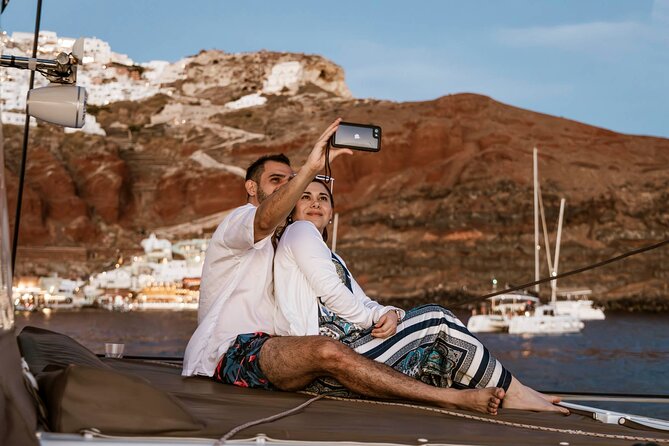 Santorini Catamaran Cruise with Greek Meal, Open-Bar and Sunset - A Greek meal with wine, beer, and soft drinks