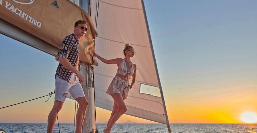 Santorini Gold Catamaran Cruise with Snorkel, BBQ & Open Bar - Red Beach brings the first swim
