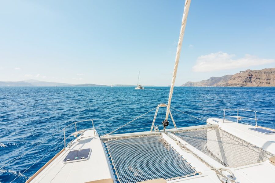 Santorini: Luxury Catamaran Day Trip with Meal and Open Bar - Why seeing Santorini from the water changes the island