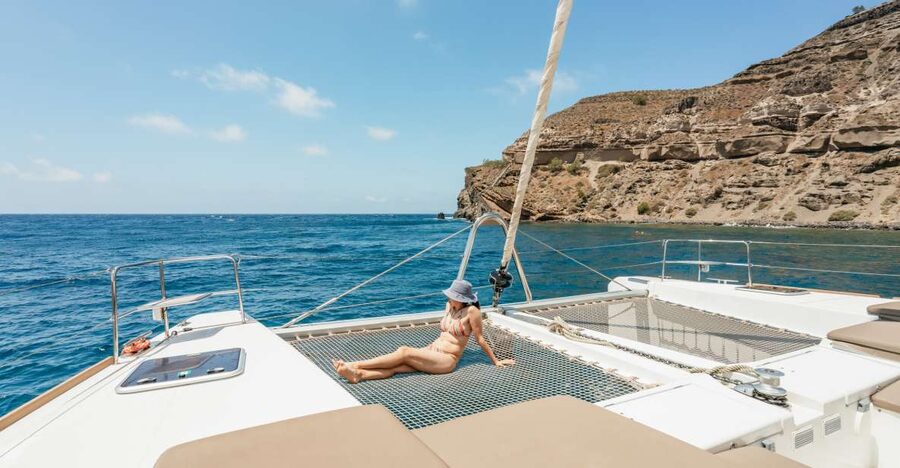 Santorini: Luxury Catamaran Day Trip with Meal and Open Bar - Red Beach and White Beach from the sea