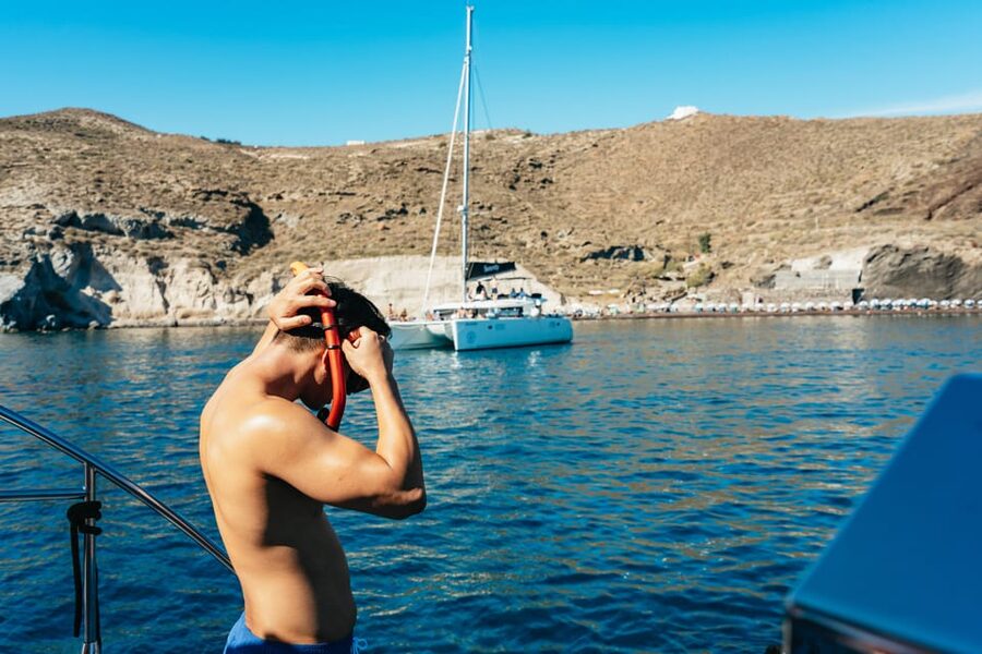 Santorini: Sailing Catamaran Cruise with BBQ and Drinks - Practical things to bring and arrange