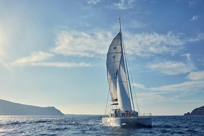 Santorini Sunset Luxury Sailing Catamaran Cruise with BBQ, drinks, transfer - The sunset from open water