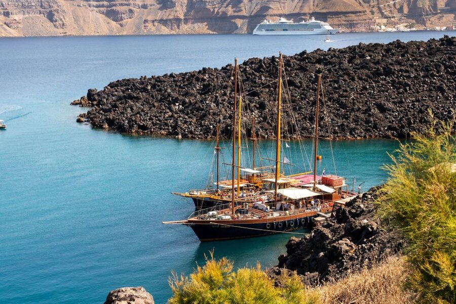 Santorini: Volcanic Islands Cruise with Hot Springs Visit - Boarding at the port and getting onto the boat