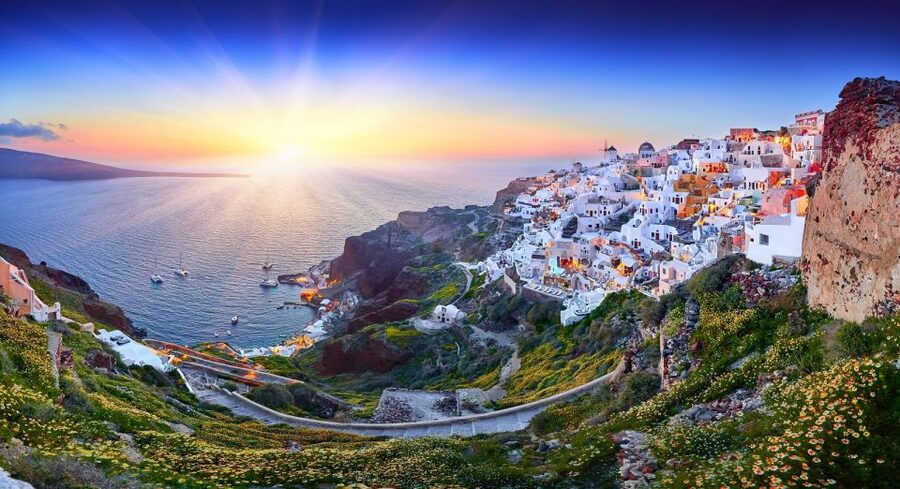Santorini: Volcano and Hot Springs Sunset Dinner Cruise - Sailing toward Thirassia